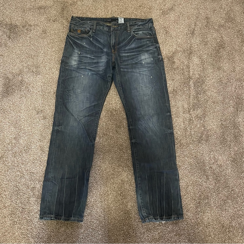 rocawear 36 x 32 straight fit jeans. the lines are intentional. yellowing inside
